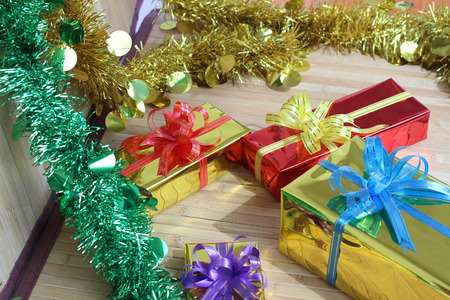 Gift box of multi-colored ribbons arranged beautifullyの写真素材