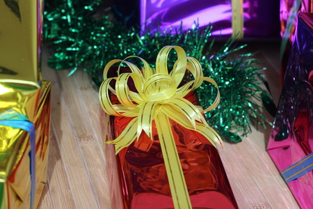 Gift box of multi-colored ribbons arranged beautifullyの写真素材