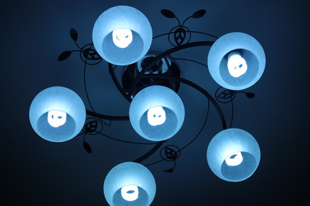 Lighting in the building shine brightly in the darkness of the nightの写真素材