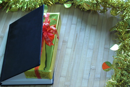 Gift box of multi-colored ribbons arranged beautifullyの写真素材