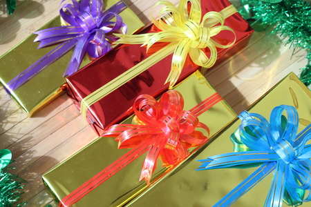 Gift box of multi-colored ribbons arranged beautifullyの写真素材