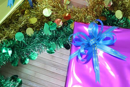 Gift box of multi-colored ribbons arranged beautifullyの写真素材