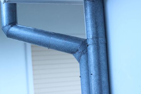Gutter next to the houseの写真素材