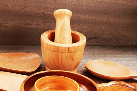 Wooden containers are arranged on a brown backgroundの写真素材