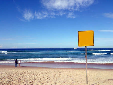 Empty sign on the beachの素材