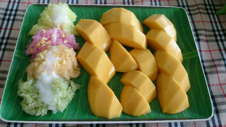 Mango with sticky rice topped with cocconut milkの素材