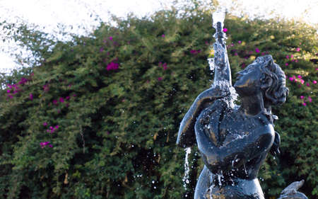 Woman water fountain shot fastの写真素材
