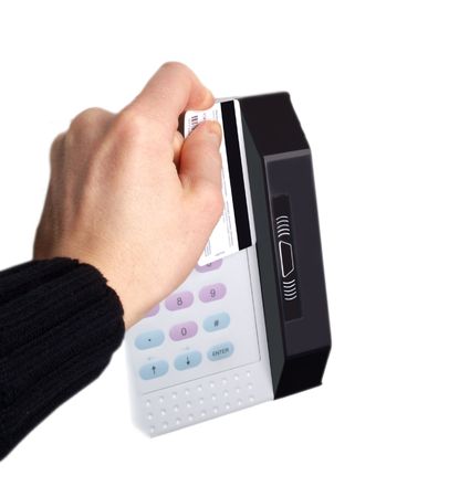 Someone sliding a magnet card on a digital device, on white backgroundの写真素材