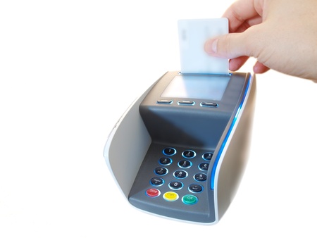 Someone inserting a chip payment card, on a payment terminalの写真素材