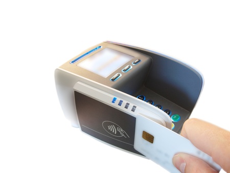 Someone holding a chip card against a payment terminalの写真素材