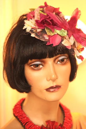 Doll woman portrait, with flowers in hair, towards yellowの写真素材