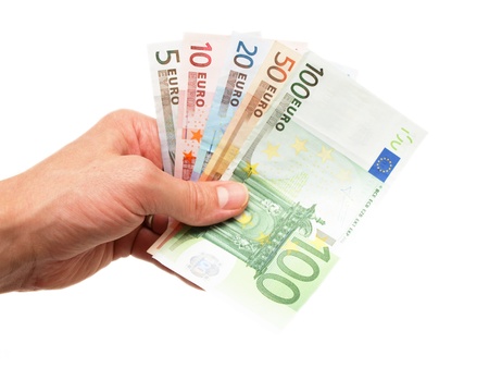 Euro currency bank notes, handed over, isolated towards white backgroundの写真素材