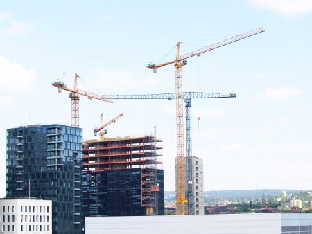Construction site overview in a city, towards blue skyのeditorial素材