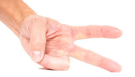 Person showing two fingers isolated on whiteの写真素材