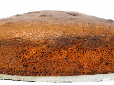 Closeup of freshly made chocolate cake baseの写真素材