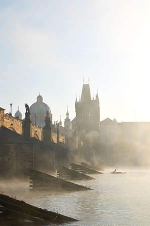 Charles bridge in Prague in the morning mistの写真素材
