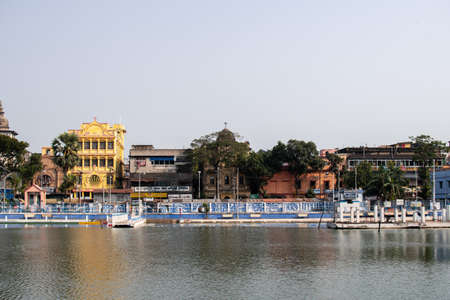 View over a local water park and the colorful facade of the nearby apartment buildings in Kolkata,...