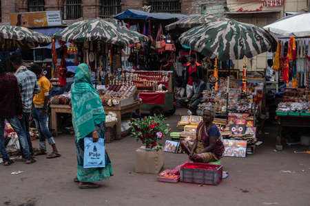 Puri, India - February 3, 2020: Unidentified people attends a street market with food, clothes and accessories on February 3, 2020 in Puri, Indiaのeditorial素材