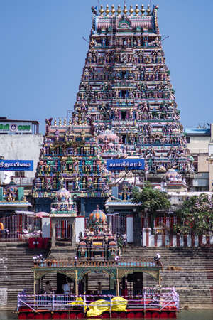 Chennai, India - February 8, 2020: View of Kapaleeshwarar Temple from across the pond by Koil Kulam on February 8, 2020 in Chennai, Indiaのeditorial素材