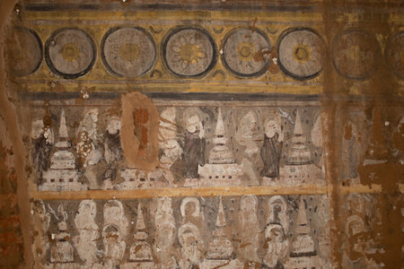 BAGAN, NYAUNG-U, MYANMAR - 2 JANUARY 2020: Historical wall paintings and drawings inside a pagoda temple in Paganのeditorial素材