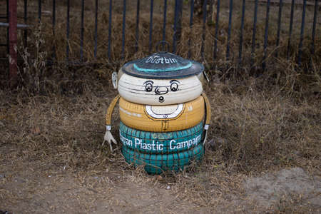 A colorful painted dustbin of a person made of old tires for the Bagan/Pagan plastic campaign in Myanmarのeditorial素材