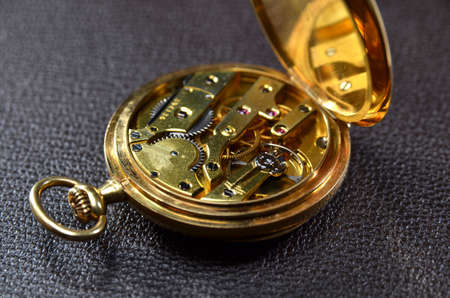 Antique golden pocket watch mechanismの写真素材