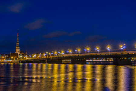 Panorama of illuminated bridge in Riga, Latviaの写真素材