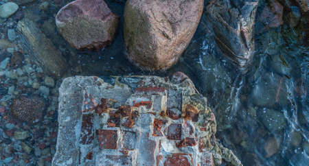 Large stones in the sea view from above