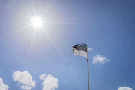 Waving Flag of Estonia, Blue, Black and Whiteの写真素材