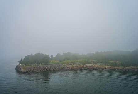 Small islands near Helsinki in the fog