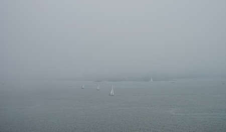 Small islands near Helsinki in the fogの写真素材
