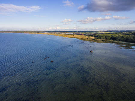 Areal view green forest with seaの写真素材