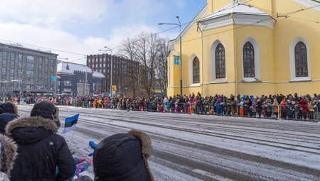 Tallinn, Estonia - February 24, 2018: Crowd of people celebrating 100 years of Estonia , in street...