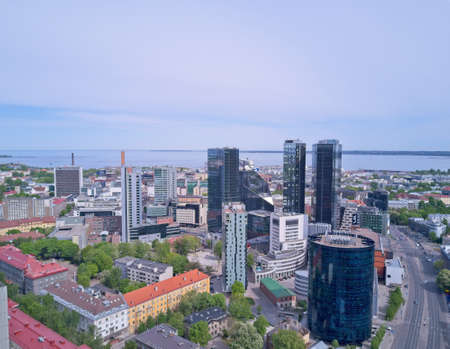TALLINN, ESTONIA - MAY, 2018 Aerial cityscape of modern business financial district with tall...