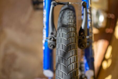 Bicycle tire spokes close up ride riding bike rubber brakes break braking valve.の写真素材