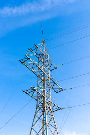 high-voltage pole wires power lines at sunset or sunrise. electricity distribution station. high voltage electric transmission tower.outdoor shotの写真素材