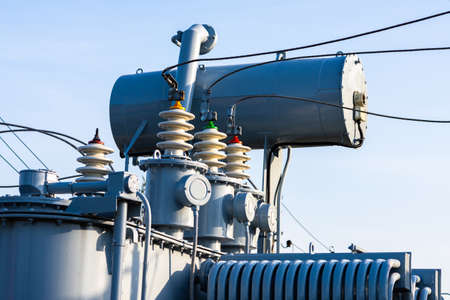 High voltage power transformer substation high voltage generator at evening or early morning outdoor shotの写真素材