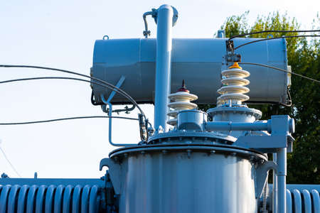 High voltage power transformer substation high voltage generator at evening or early morning outdoor shotの写真素材