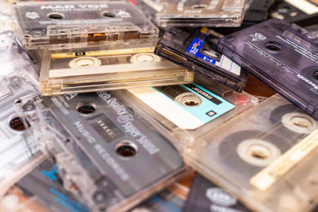 Telsiai ,Lithuania-10 14 2020, old cassette tapes on a table.Top view close up photography.のeditorial素材