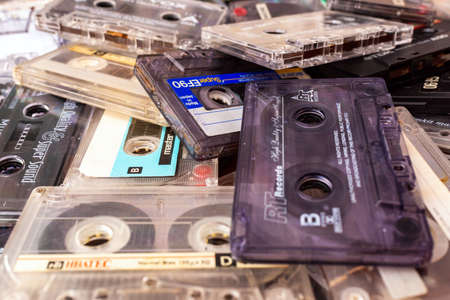 Telsiai ,Lithuania-10 14 2020, old cassette tapes on a table.Top view close up photography.