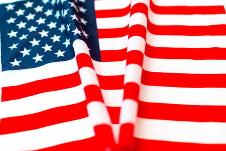 Top view american flag and shape inscription v or victory USA election concept.の写真素材
