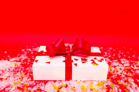christmas gift, box, xmas background, abstract imitation snowfall winter.New year concept.Studio shot.Copy space.の写真素材