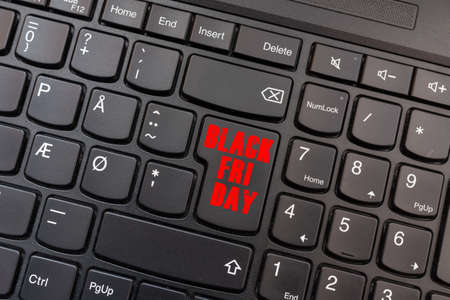 Computer notebook keyboard inscriptions black friday on key. Black Friday e commerce concept.の写真素材