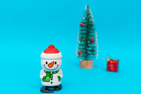 snowman, presents and Christmas tree with copy space.Christmas and new year celebration.の写真素材