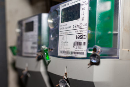 Two smart electric power meter counter measuring power usage.Indoors shot.の写真素材