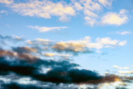 Dramatic clouds at sunset. clouds sunset at evening winter.the sun is hiding in the sky.