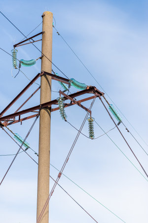 High Voltage electric substation with transformers.High voltage switchgear equipment on a blue sky.の写真素材
