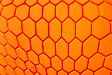 Orange hexagon pattern background Is a rubber decorated closeup.Orange hexagon abstract background texture.Macro indoors shot.の写真素材