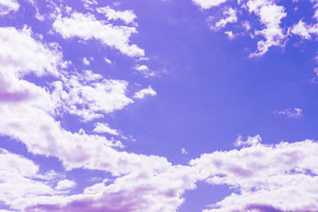 Purple clouds with beautiful blue sky,on the heaven.Amazing nature background.Toned.の写真素材