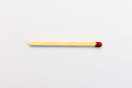 Closeup match on a white background with clipping path.matchstick flat lay,copy space,selective focus.Studio shot.の写真素材